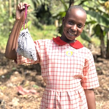 SAG Kit Distribution image showing Kiziba Primary School girls receiving 434 kits in Kikyusa, Uganda on Feb 8, 2024