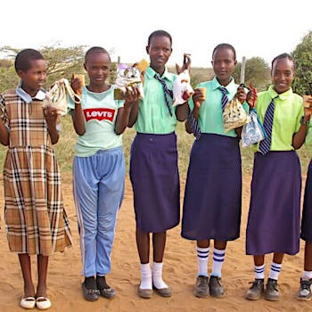 SAG Kit Distribution image showing Ewaso Primary School girls receiving 143 kits in Ewaso, Kenya on Mar 7, 2024