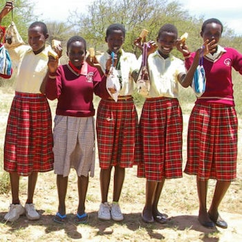 SAG Kit Distribution image showing Il Motiok Primary School girls receiving 117 kits in Il Motiok, Kenya on Mar 7, 2024