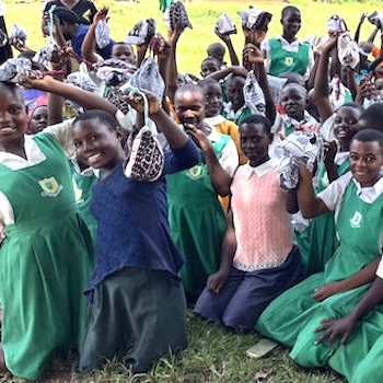 SAG Kit Distribution image showing Bulamba Primary School girls receiving 248 kits in Kalasi, Uganda on Mar 11, 2024