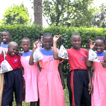 SAG Kit Distribution image showing Bulamba Advanced Primary School girls receiving 89 kits in Kalasi, Uganda on Mar 11, 2024