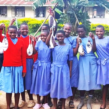 SAG Kit Distribution image showing Nyabushabi Primary School girls receiving 66 kits in Bubare, Uganda on Apr 5, 2024