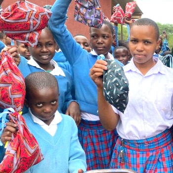 SAG Kit Distribution image showing Engeno Secondary School girls receiving 213 kits in Sukuro, Tanzania on Apr 19, 2024