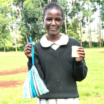 SAG Kit Distribution image showing Kanoga Secondary School girls receiving 147 kits in Kamatwa, Kenya on May 17, 2024