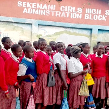 SAG Kit Distribution image showing Sakenani Girls High School girls receiving 50 kits in Sakenani, Kenya on May 24, 2024