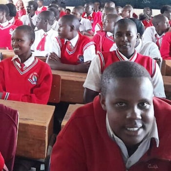 SAG Kit Distribution image showing Sakenani Girls High School girls receiving 50 kits in Sakenani, Kenya on May 24, 2024