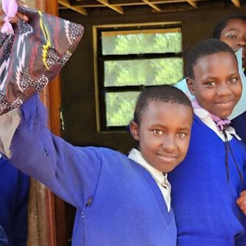 SAG Kit Distribution image showing Qedangonyi Primary School girls receiving 26 kits in Manyara, Tanzania on May 29, 2024