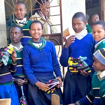 SAG Kit Distribution image showing Jerodom Primary School girls receiving 48 kits in Manyara, Tanzania on May 29, 2024