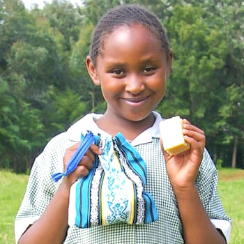 SAG Kit Distribution image showing Kiriti Primary School girls receiving 192 kits in Kiriti, Kenya on May 31, 2024