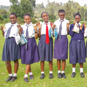 SAG Kit Distribution image showing Ihwa Secondary School girls receiving 137 kits in Ihwa, Kenya on May 31, 2024