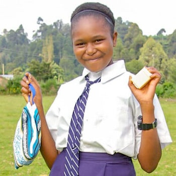 SAG Kit Distribution image showing Ihwa Secondary School girls receiving 137 kits in Ihwa, Kenya on May 31, 2024