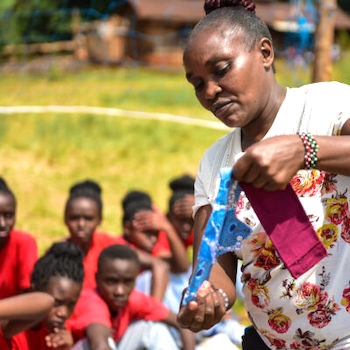 SAG Kit Distribution image showing Kihatha Primary School girls receiving 158 kits in Kihatha, Kenya on Jun 11, 2024