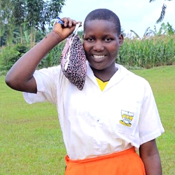 SAG Kit Distribution image showing Kibuzi Primary School girls receiving 77 kits in Kayunga, Uganda on Jun 13, 2024