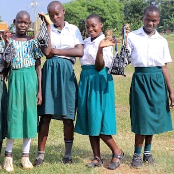 SAG Kit Distribution image showing Kiwangula Primary School girls receiving 73 kits in Kayunga, Uganda on Jun 13, 2024