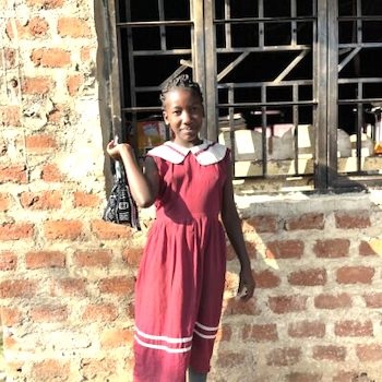 SAG Kit Distribution image showing Vision Junior School girls receiving 100 kits in Busula, Uganda on Jun 18, 2024