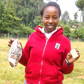 SAG Kit Distribution image showing Kigwandi Secondary School girls receiving 92 kits in Kigwandi, Kenya on Jun 24, 2024