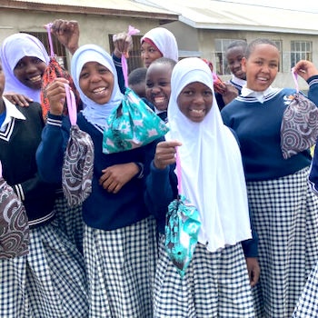 SAG Kit Distribution image showing Olmoti Secondary School girls receiving 113 kits in Manyara, Tanzania on Jul 31, 2024