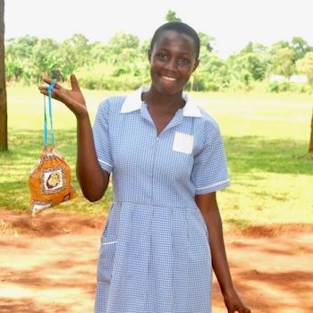SAG Kit Distribution image showing Busota Primary School girls receiving 192 kits in Busota, Uganda on Aug 13, 2024