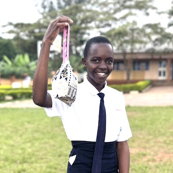 SAG Kit Distribution image showing Kakoola High School girls receiving 79 kits in Luwero, Uganda on Aug 15, 2024