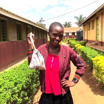 SAG Kit Distribution image showing Kazo Primary School girls receiving 52 kits in Nansana, Uganda on Sep 5, 2024