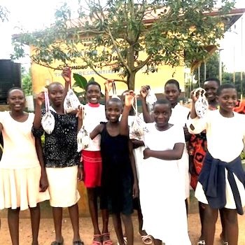 SAG Kit Distribution image showing Nakyesanja Primary School girls receiving 128 kits in Nabweru, Uganda on Sep 5, 2024