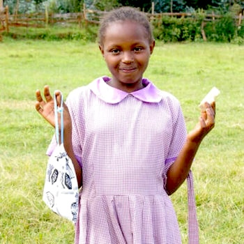 SAG Kit Distribution image showing Lion of Mathari Primary School girls receiving 465 kits in Kahuria, Kenya on Oct 3, 2024