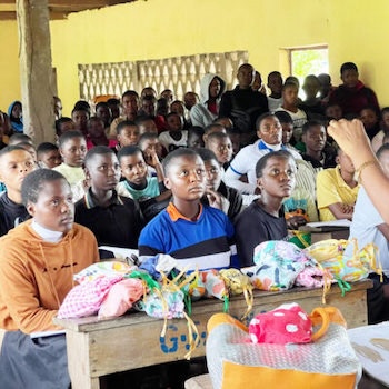 SAG Kit Distribution image showing Bomaka Secondary School girls receiving 246 kits in Bomaka, Cameroon on Oct 9, 2024