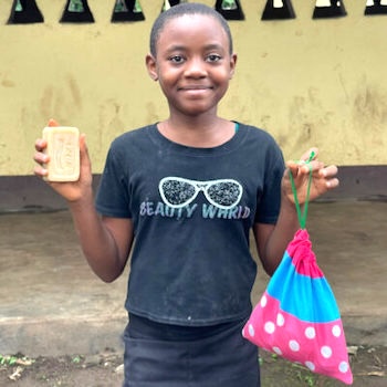 SAG Kit Distribution image showing Bomaka Secondary School girls receiving 246 kits in Bomaka, Cameroon on Oct 9, 2024