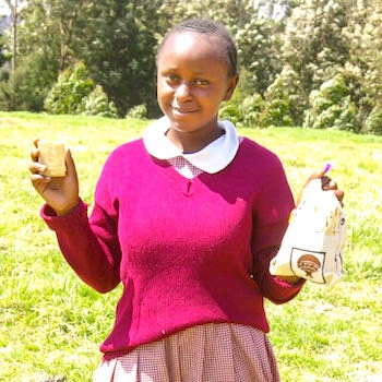 SAG Kit Distribution image showing Kanjora Primary School girls receiving 140 kits in Ihururu, Kenya on Oct 11, 2024