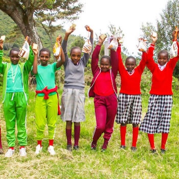 SAG Kit Distribution image showing Ikumari Primary School girls receiving 164 kits in Mweiga, Kenya on Oct 22, 2024