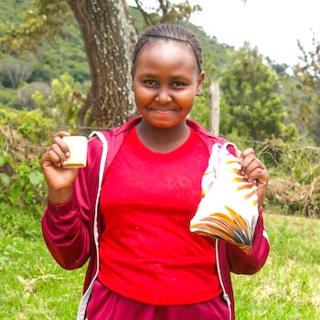 SAG Kit Distribution image showing Ikumari Primary School girls receiving 164 kits in Mweiga, Kenya on Oct 22, 2024