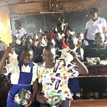 SAG Kit Distribution image showing Standard Junior School girls receiving 91 kits in SSi, Uganda on Nov 1, 2024