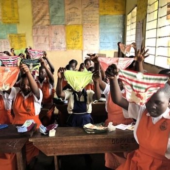 SAG Kit Distribution image showing St. Henry Najungu School girls receiving 36 kits in SSi, Uganda on Nov 1, 2024