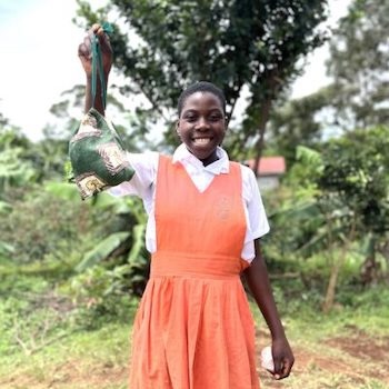 SAG Kit Distribution image showing St. Henry Najungu School girls receiving 36 kits in SSi, Uganda on Nov 1, 2024