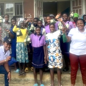 SAG Kit Distribution image showing Muvo Primary School girls receiving 23 kits in SSi, Uganda on Nov 1, 2024