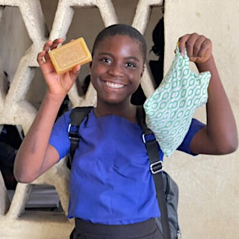 SAG Kit Distribution image showing Summerset Bilingual College girls receiving 242 kits in Molyko, Cameroon on Nov 7, 2024