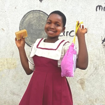SAG Kit Distribution image showing Christ the King Primary School girls receiving 49 kits in Wonya Mavio, Cameroon on Nov 21, 2024