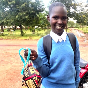 SAG Kit Distribution image showing Loibor Siret Secondary School girls receiving 21 kits in Manyara, Tanzania on Jan 23, 2025