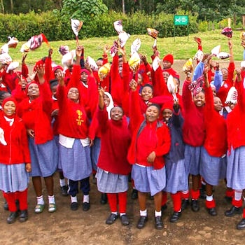 SAG Kit Distribution image showing Huhoini Secondary School girls receiving 196 kits in Huhoini, Kenya on Jan 30, 2025