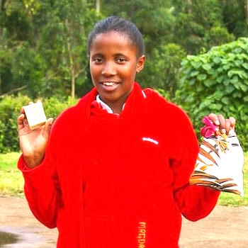 SAG Kit Distribution image showing Huhoini Secondary School girls receiving 196 kits in Huhoini, Kenya on Jan 30, 2025