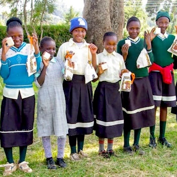 SAG Kit Distribution image showing Gathathiini Primary School girls receiving 145 kits in Kirurumi, Kenya on Feb 7, 2025