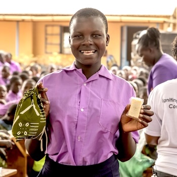 SAG Kit Distribution image showing Sigalame Primary School girls receiving 250 kits in Sigalame, Kenya on Feb 21, 2025