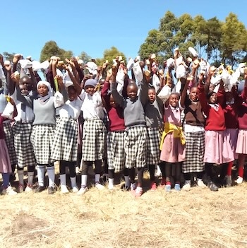 SAG Kit Distribution image showing Gitegi Primary School girls receiving 172 kits in Gitegi, Kenya on Mar 14, 2025