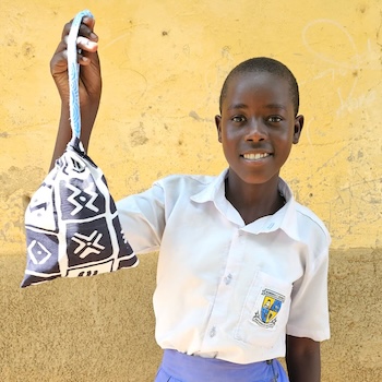 SAG Kit Distribution image showing Runengo Secondary School girls receiving 148 kits in Mbarara, Uganda on Mar 18, 2025