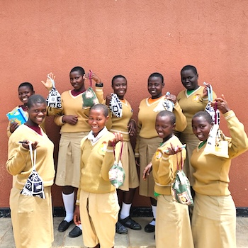 SAG Kit Distribution image showing Bukiro Seed School girls receiving 89 kits in Mbarara, Uganda on Mar 20, 2025