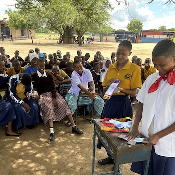SAG Kit Distribution image showing Nasinyai High School girls receiving 221 kits in Mererani, Tanzania on Apr 11, 2025