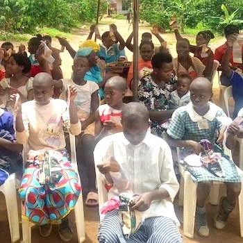 SAG Kit Distribution image showing Good Hope Primary School girls receiving 100 kits in Nakilya, Uganda on Apr 24, 2025