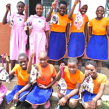 SAG Kit Distribution image showing Rwenengo Primary School girls receiving 89 kits in Buubare, Uganda on Apr 25, 2025