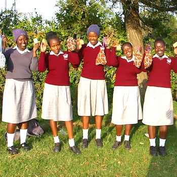 SAG Kit Distribution image showing Celebrating Menstrual Health Day girls receiving 647 kits in Watuka, Kenya on May 28, 2025