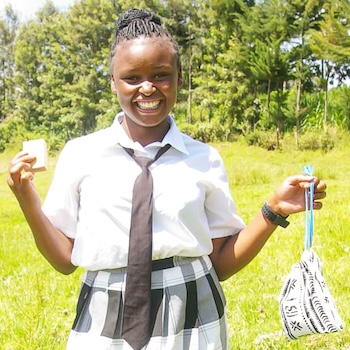 SAG Kit Distribution image showing Ngooru Secondary School girls receiving 211 kits in Tetu, Kenya on May 30, 2025